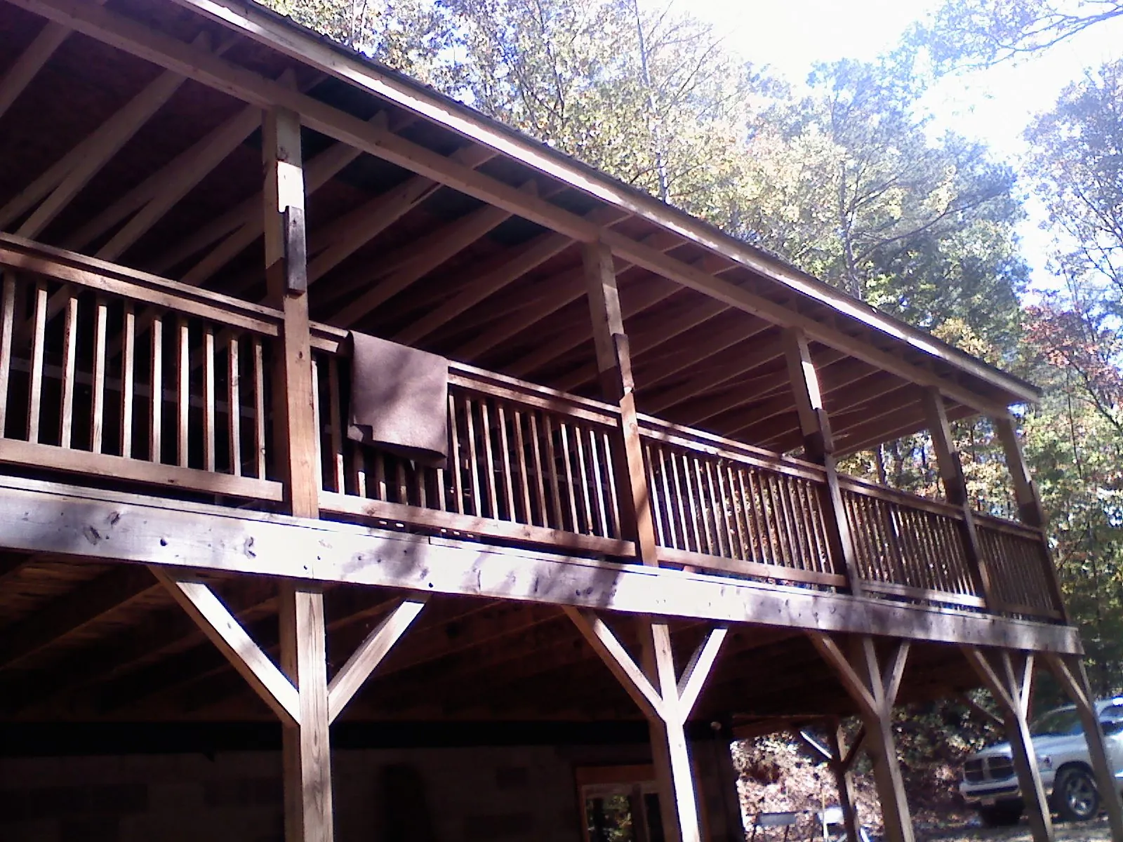 Timber framing under a new elevated porch and deck — Roof Leak Repair in Washington Depot by Roofing Brothers
